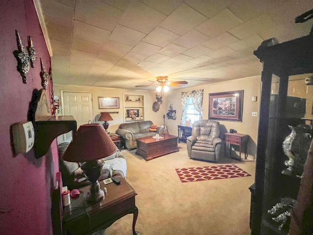 living room with carpet flooring and ceiling fan