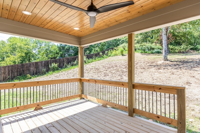 wooden deck featuring ceiling fan