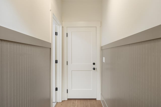 hall with light hardwood / wood-style floors