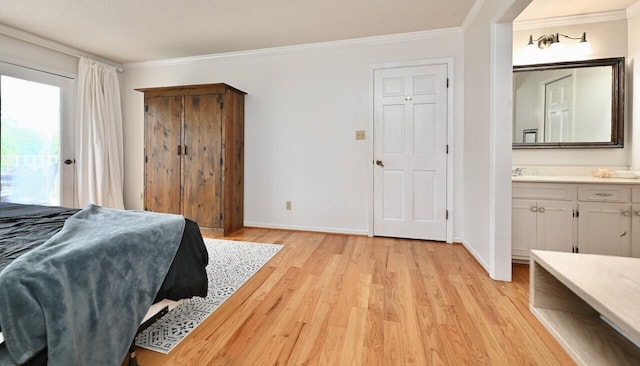 bedroom featuring baseboards, ornamental molding, light wood-type flooring, and access to outside