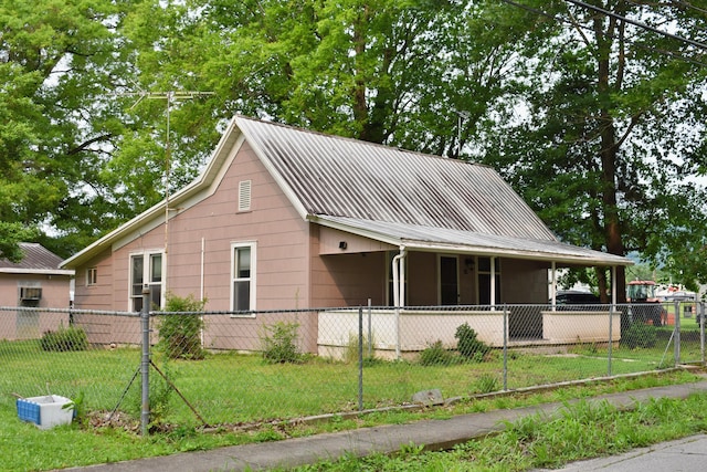 174 E Jackson Ave, Spring City, TN 37381 - view of front of property with metal roof