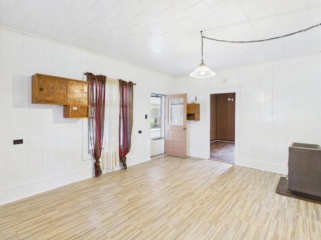 174 E Jackson Ave, Spring City, TN 37381 - spare room featuring wood finished floors and baseboards