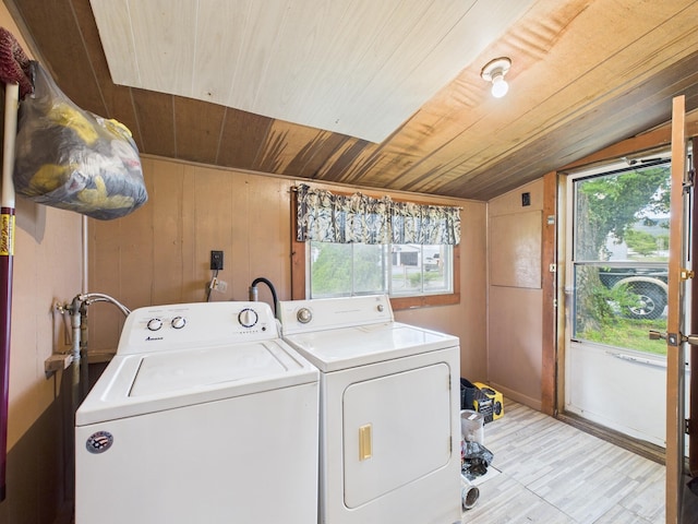 174 E Jackson Ave, Spring City, TN 37381 - laundry room featuring separate washer and dryer, wooden ceiling, healthy amount of natural light, light wood finished floors, and wooden walls