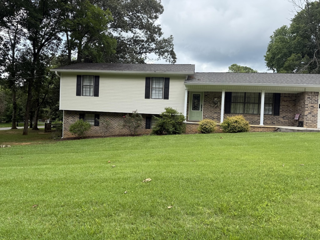 2275 Tenneesee Nursery Rd, Cleveland, TN 37311 - tri-level home featuring a front yard and brick siding