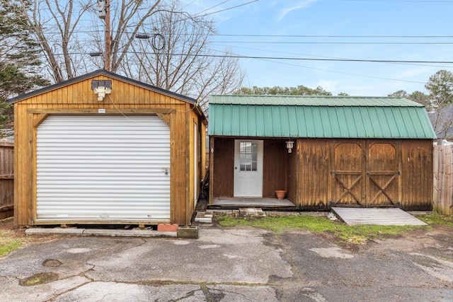 view of outdoor structure with a garage