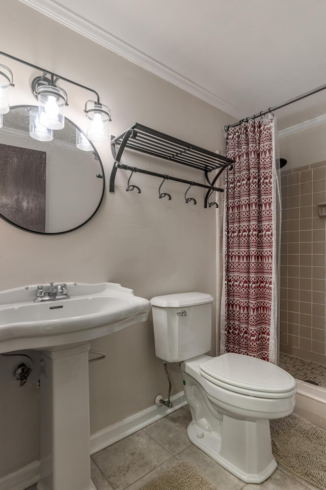 bathroom featuring tile patterned floors, sink, a shower with shower curtain, toilet, and ornamental molding