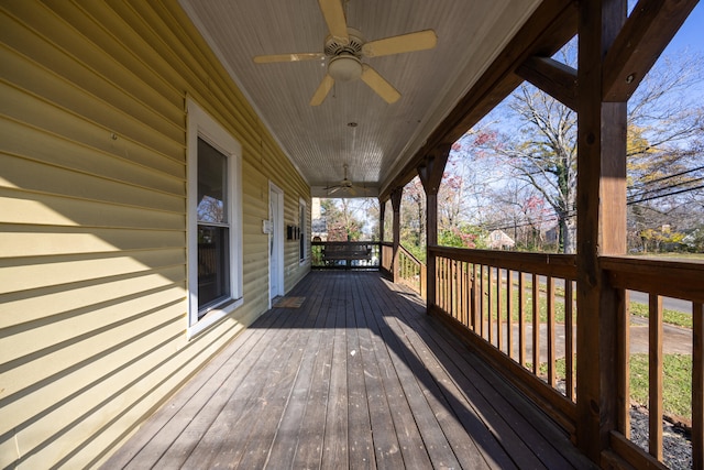 wooden deck with ceiling fan