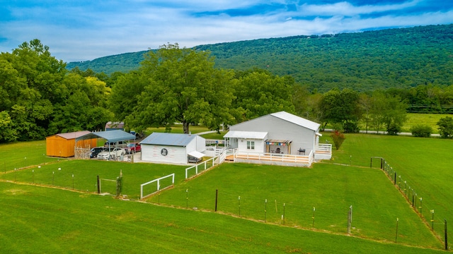 birds eye view of property featuring a rural view