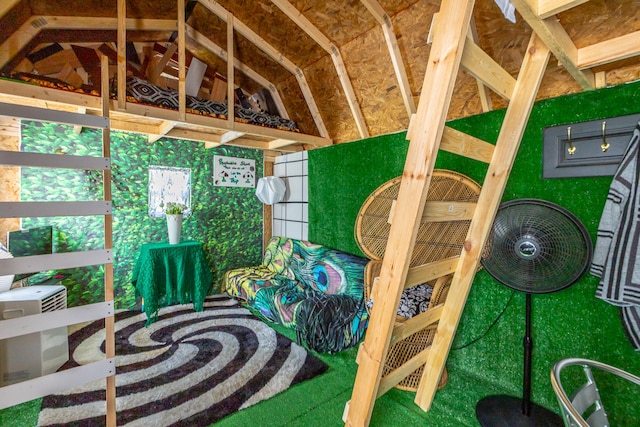 sunroom featuring lofted ceiling