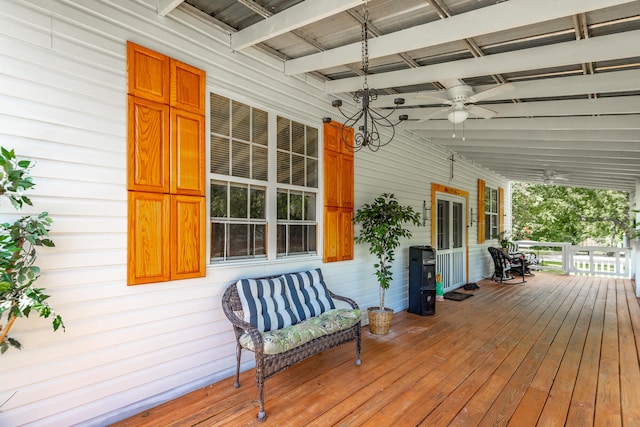 deck with ceiling fan and a porch