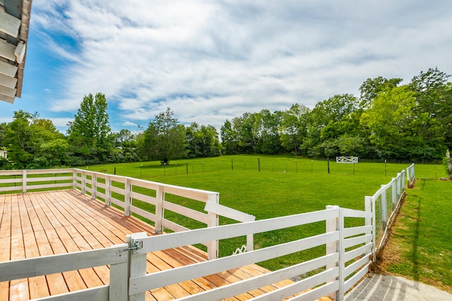 wooden deck with a yard