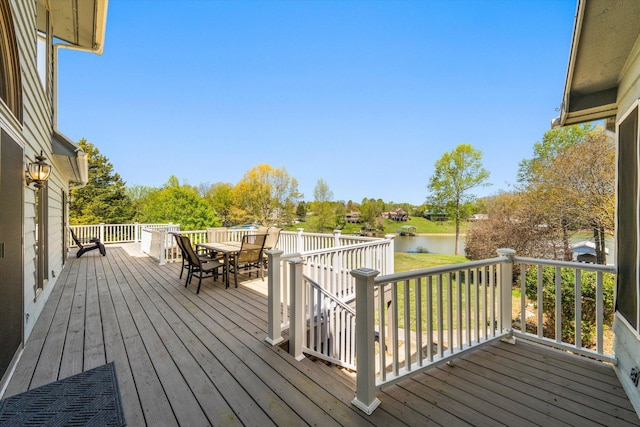 131 Corntassel Shrs, Vonore, TN 37885 - wooden deck with outdoor dining space and a water view