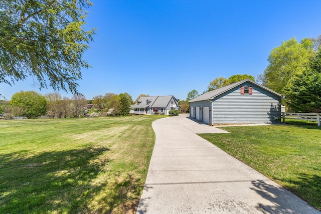 131 Corntassel Shrs, Vonore, TN 37885 - view of yard with a garage, fence, and an outbuilding