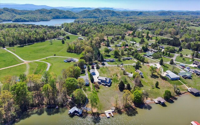 131 Corntassel Shrs, Vonore, TN 37885 - drone / aerial view with a view of trees and a water view