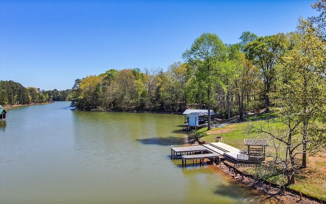 131 Corntassel Shrs, Vonore, TN 37885 - view of dock featuring a water view and a wooded view