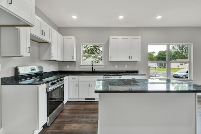 523 13th St SE, Cleveland, TN 37311 - kitchen with electric range, a sink, dark wood-style floors, recessed lighting, and dark stone countertops