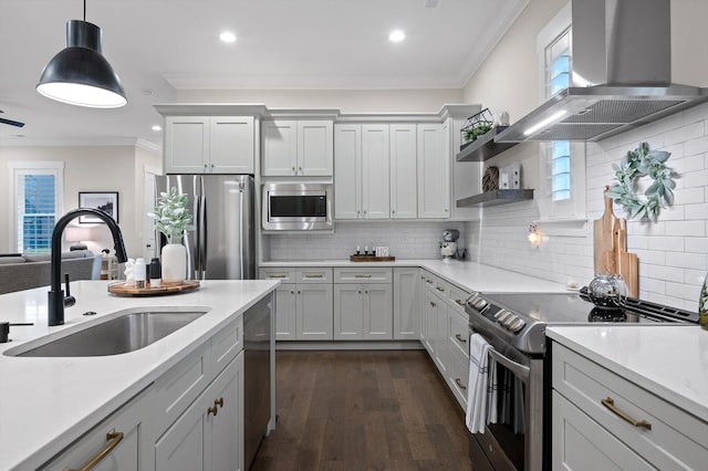 kitchen featuring crown molding, open shelves, appliances with stainless steel finishes, a sink, and wall chimney exhaust hood