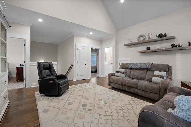 living area featuring recessed lighting, ornamental molding, wood finished floors, and vaulted ceiling