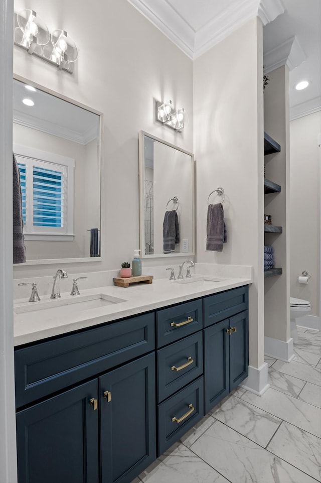 full bath featuring a sink, ornamental molding, and marble finish floor