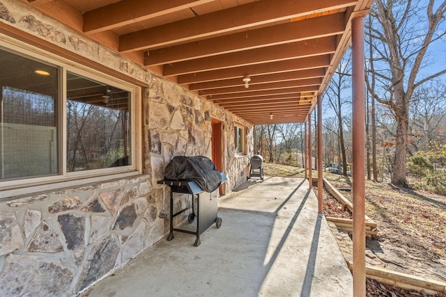 view of patio with a grill