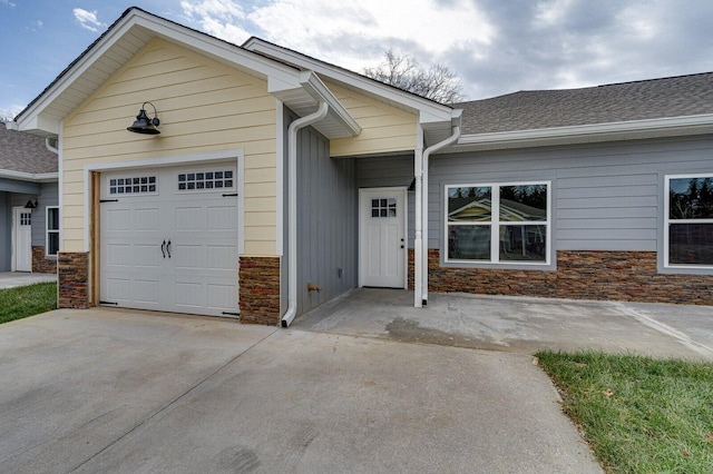 single story home featuring a garage