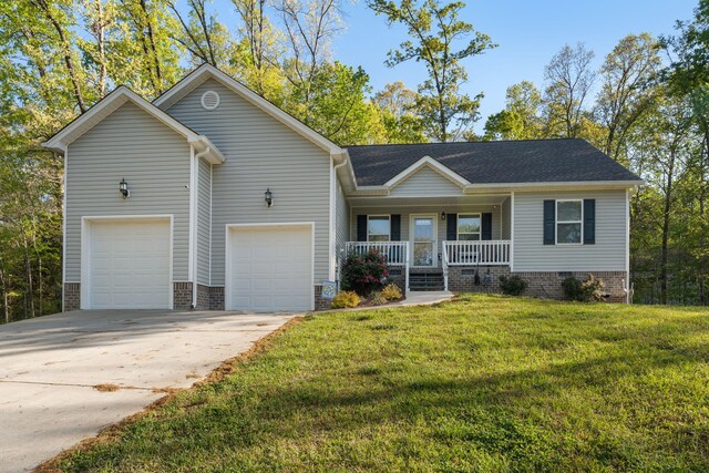 view of front of home featuring concrete driveway, a shingled roof, an attached garage, a porch, and a front yard