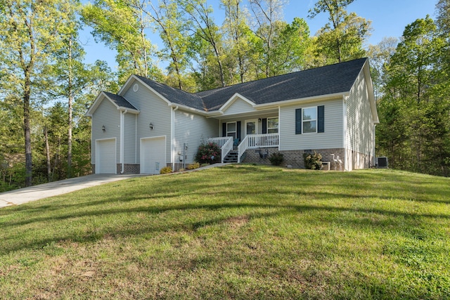 single story home with central AC, an attached garage, driveway, a porch, and a front yard