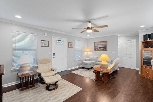 living area featuring ceiling fan, crown molding, wood finished floors, and recessed lighting
