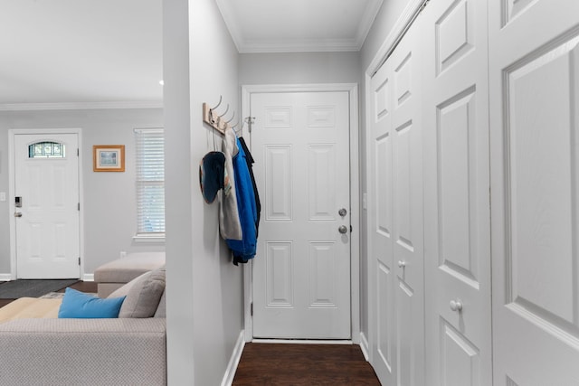 entryway featuring crown molding, baseboards, and dark wood-style flooring