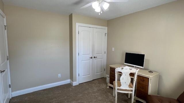 office space with baseboards, carpet flooring, and ceiling fan