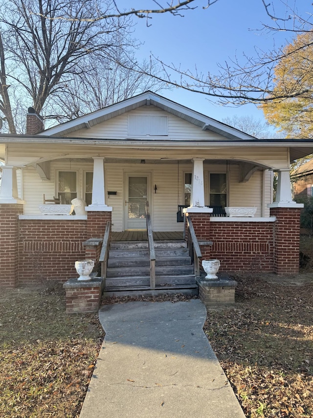 bungalow-style home with a porch