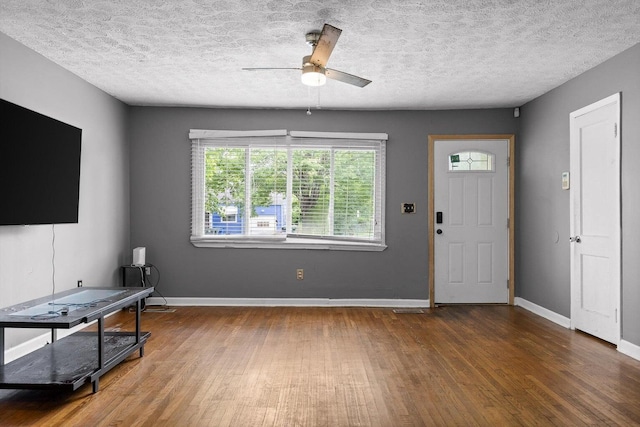 608 Parkview Dr, Chattanooga, TN 37411 - foyer entrance featuring wood finished floors, ceiling fan, baseboards, and a textured ceiling