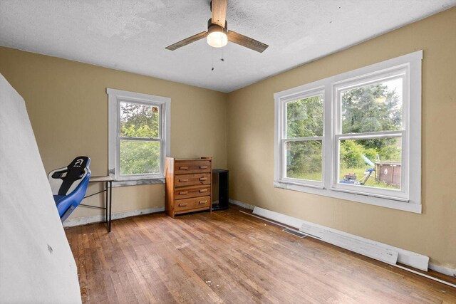 608 Parkview Dr, Chattanooga, TN 37411 - office area featuring wood finished floors, baseboards, and a ceiling fan