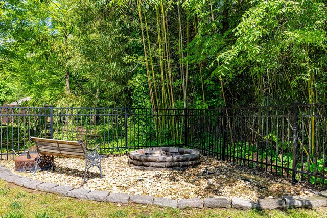 2734 Kensington Park Trl NW, Cleveland, TN 37312 - view of yard with an outdoor fire pit and fence