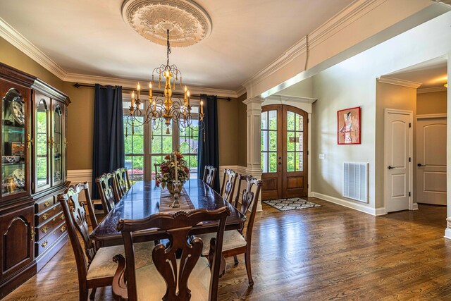 2734 Kensington Park Trl NW, Cleveland, TN 37312 - dining space with french doors, a chandelier, wood finished floors, crown molding, and decorative columns