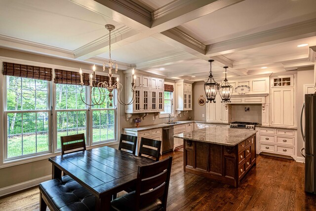 2734 Kensington Park Trl NW, Cleveland, TN 37312 - kitchen featuring a chandelier, a sink, appliances with stainless steel finishes, glass insert cabinets, and healthy amount of natural light