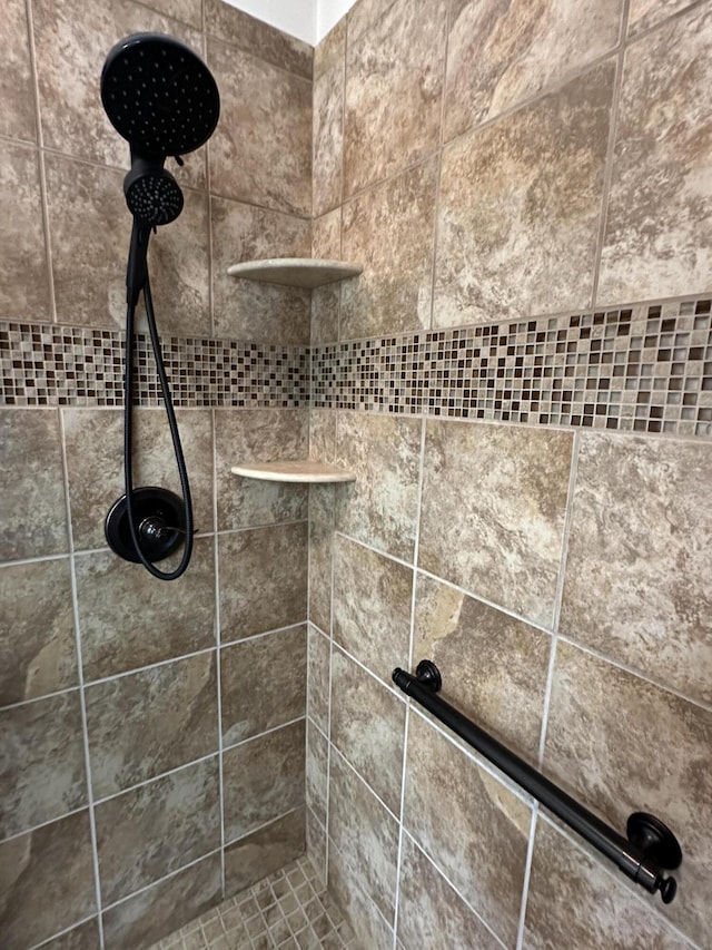 details featuring a tile shower