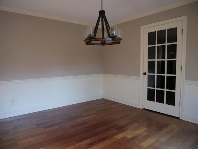 3611 Sourwood Trl NW, Cleveland, TN 37312 - unfurnished dining area featuring a chandelier, dark wood-type flooring, ornamental molding, and baseboards