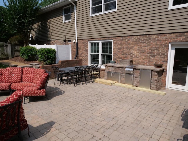 3611 Sourwood Trl NW, Cleveland, TN 37312 - view of patio with area for grilling, outdoor lounge area, and outdoor dining area