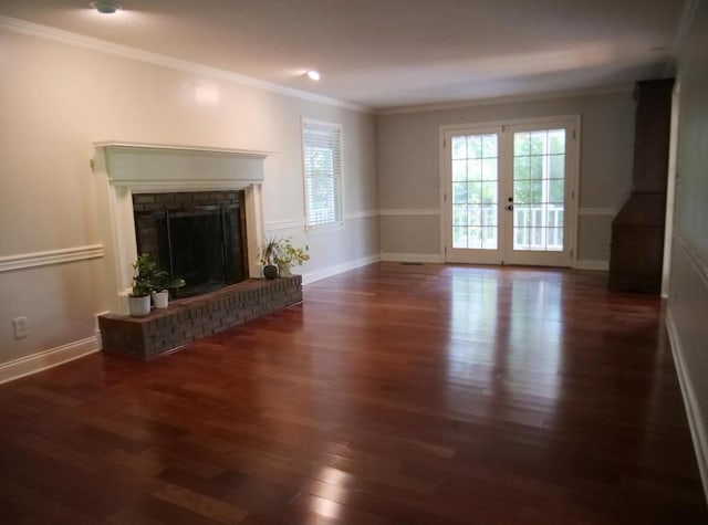 3611 Sourwood Trl NW, Cleveland, TN 37312 - unfurnished living room with healthy amount of natural light, wood finished floors, ornamental molding, baseboards, and french doors