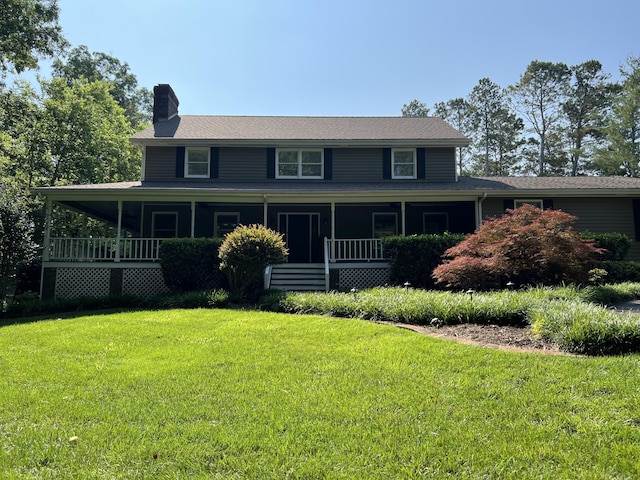 3611 Sourwood Trl NW, Cleveland, TN 37312 - view of front of house with a chimney, a front lawn, and covered porch