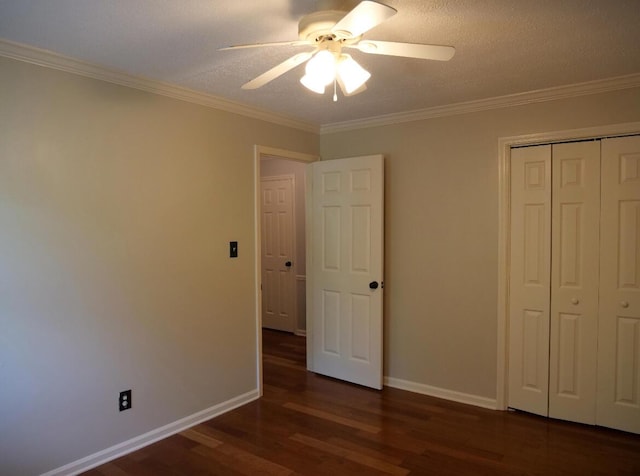 3611 Sourwood Trl NW, Cleveland, TN 37312 - unfurnished bedroom featuring dark wood finished floors, baseboards, ornamental molding, a closet, and ceiling fan