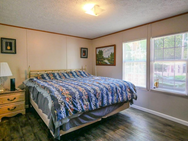 263 County Road 967, Riceville, TN 37370 - bedroom with crown molding, wood finished floors, a textured ceiling, and baseboards