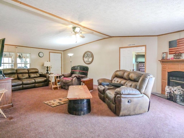 263 County Road 967, Riceville, TN 37370 - living area with carpet flooring, a ceiling fan, a textured ceiling, a fireplace, and ornamental molding