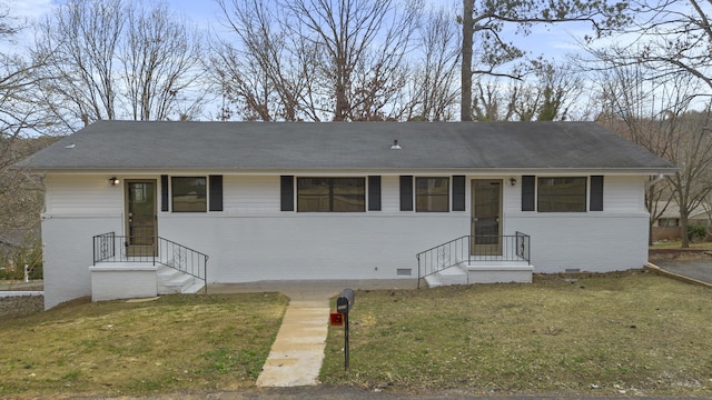 ranch-style home with crawl space, a front lawn, and brick siding