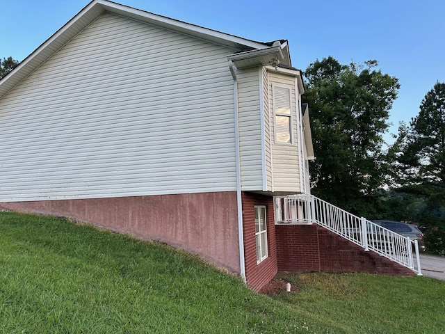 740 Grassy Branch Rd, Dayton, TN 37321 - view of property exterior featuring a lawn and stairs
