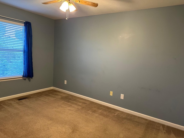 740 Grassy Branch Rd, Dayton, TN 37321 - carpeted spare room featuring ceiling fan and baseboards