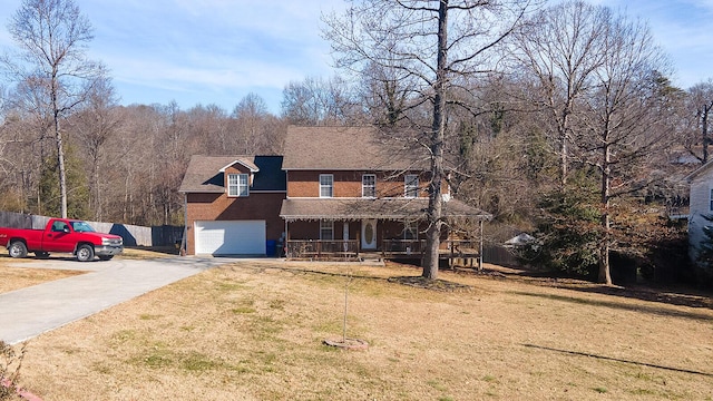 123 Carson Pl, Clinton, TN 37716 - view of front of home featuring covered porch, asphalt driveway, and an attached garage