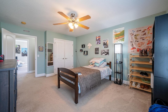 123 Carson Pl, Clinton, TN 37716 - bedroom with light carpet, a closet, ceiling fan, and baseboards