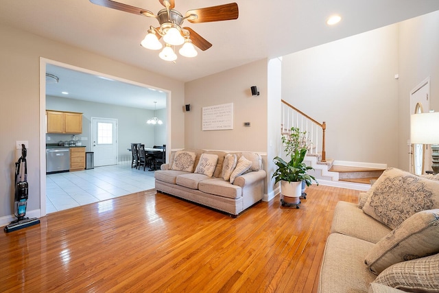 123 Carson Pl, Clinton, TN 37716 - living room with light wood-type flooring, stairway, ceiling fan, and recessed lighting